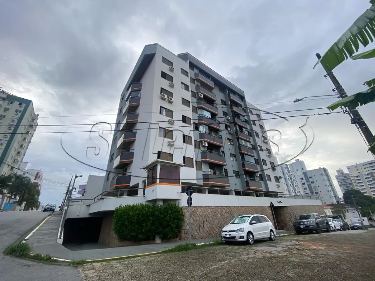 LOTE 001 - Apartamento e garagem