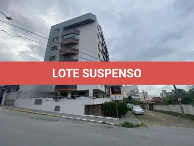 LOTE 001 - Apartamento e garagem