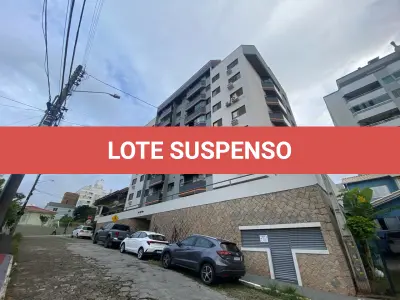 LOTE 001 - Apartamento e garagem