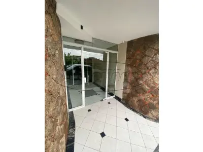 LOTE 001 - Apartamento e garagem