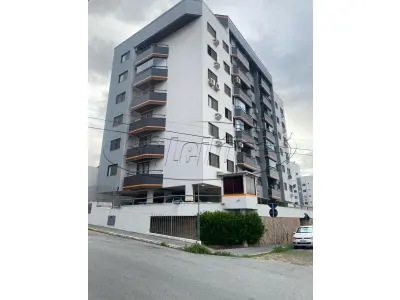 LOTE 001 - Apartamento e garagem